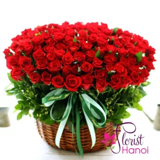 Basket of 100 red roses for girlfriend with fresh greenery in Hanoi