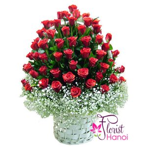 99 red roses arranged with baby's breath