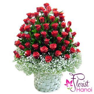 99 red roses arranged with baby's breath