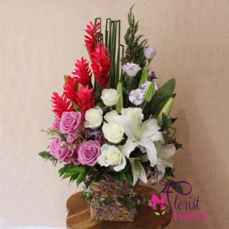 Best flowers for Mommy with purple roses, white lilies, and fresh seasonal blooms