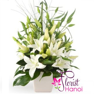 Christmas lily arrangement