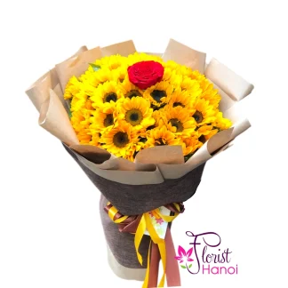 Sunflower bouquet with a red rose in the center