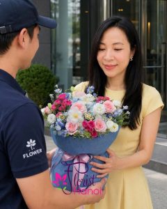 Woman receiving a romantic flower bouquet