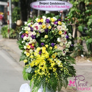Hanoi sympathy flowers delivery service featuring a white and yellow flowers