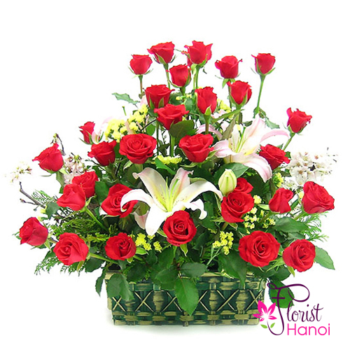 mixed flowers of red roses and lilies