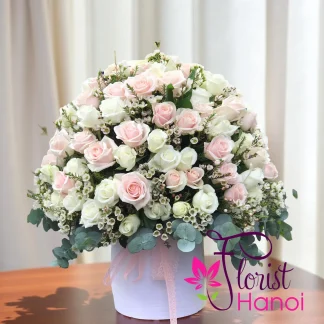 Mixed white and pink rose basket with eucalyptus in Hanoi