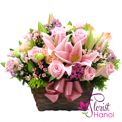 Pink arrangement of roses and lilies