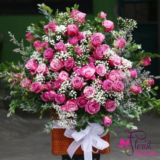 Purple rose mix babie flower arrangement