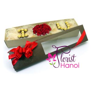 Red roses and chocolate in box for Valentines day