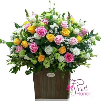 Mixed roses basket with pink yellow and white roses in Hanoi