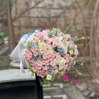 Sweet flower bouquet with pink spray roses and white hydrangeas in Vietnam