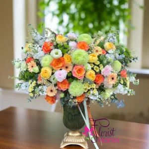 Vibrant orange and green flower arrangement