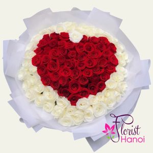 Heart shaped bouquet of red and white roses