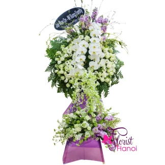Grand white condolence and funeral flower arrangement in Hanoi